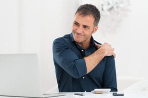 Businessman Suffering From RoanokeShoulder Pain