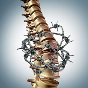 chronic pain in back depicted with spine and barbed wire