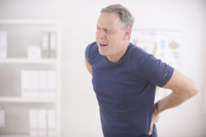 man suffering from spinal disc pain